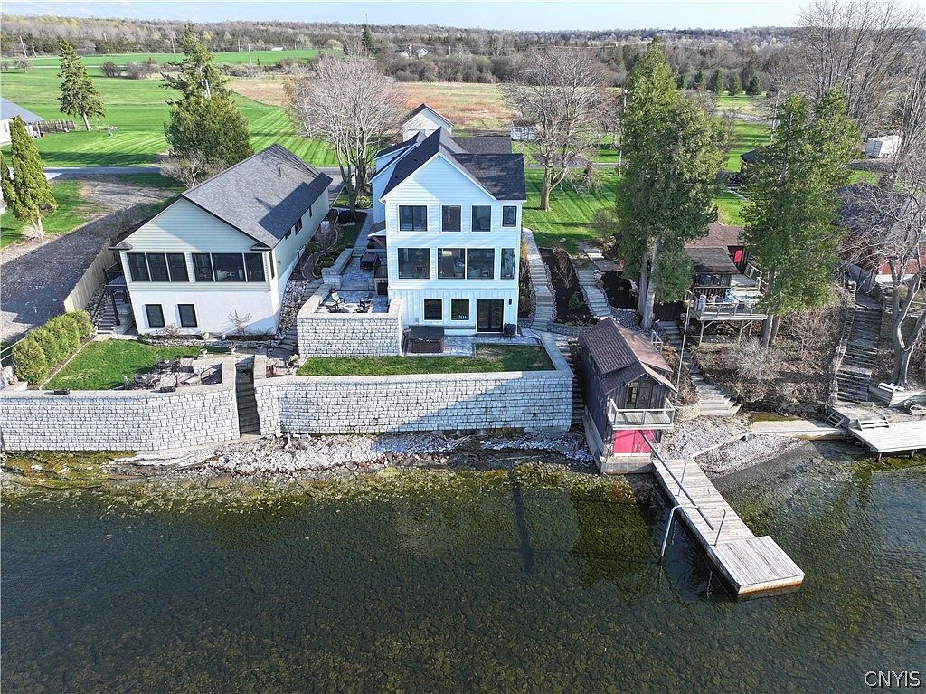 Aerial view of the house, boathouse, cottage and two docks